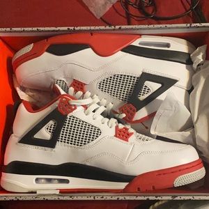 Air jordan 4 retro size 13. Red, white, and black.